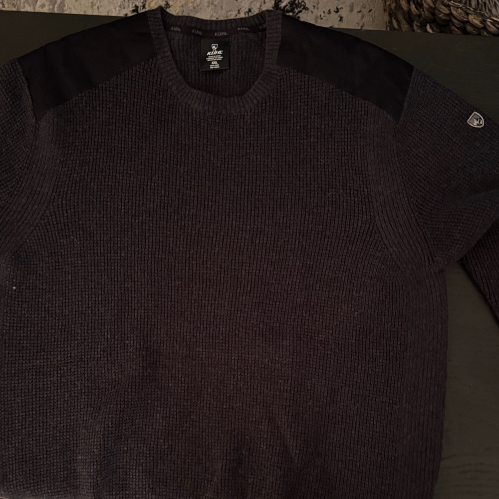 Kuhl black cable knit crew neck. Like new.